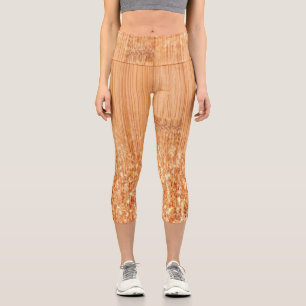 Funkelnd orangefarbener Bambusholzprint Capri Leggings
