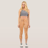 Funkelnd orangefarbener Bambusholzprint Capri Leggings (Vorderseite)