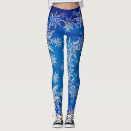 Funkelnd silberne Schneeflocken auf Blau Leggings