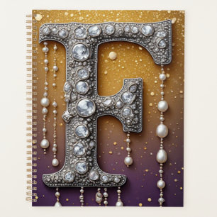 Funkelnder Buchstabe F mit goldenem Glittertropfen Planer