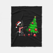 Funny Black Cat Pushing Christmas Tree Over Cat Wh Fleecedecke (Vorderseite)
