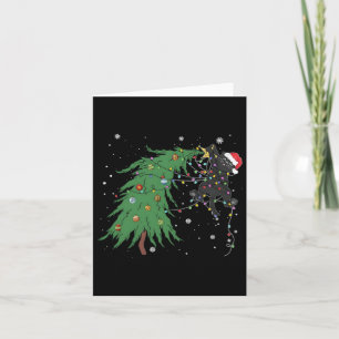 Funny Black Cat Santa hat sich im Weihnachtsbaum v Karte