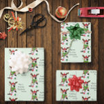 Funny Christmas Calico Cat Geschenkpapier Set<br><div class="desc">Niedliche Kalico-Katze gekleidet in Weihnachtsbeleuchtung,  gestopfte Antlers,  Weihnachts-Weihnachtsmannmütze,  und ein großer grüner Bogen vor einem Hintergrund von hellgrün,  das Kätzchen ist nicht glücklich!</div>