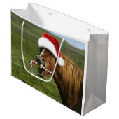 Funny Christmas horse with Santa Smiling Große Geschenktüte (Vorderseite Schrägansicht)