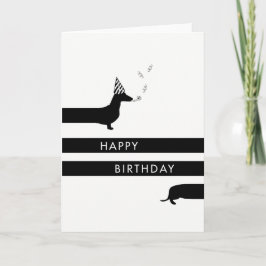 Funny Dackel mit Party, das zum Geburtstag glückli Karte
