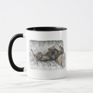 Funny Doberman on Sofa Tasse