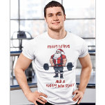 Funny Fitness Christmas Liftmas Barbell Santa T-Shirt<br><div class="desc">Fröhliche Liftmas und ein frohes neues Rear - dieses festliche Fitnessstudio-Shirt ist eine lustige Fitness Weihnachtsgrüße und das ideale Geschenk für Trainer oder Gymnastikpartner in Ihrem Leben. Dieses Shirt verfügt über ein super starkes und passendes Santa Claus, das einen Barbell hochzieht, komplett geschluckt. Der Weihnachtsmann, die fröhliche und faule Figur,...</div>