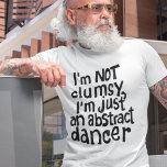 Funny Fun nicht ungeschickt Abstrakter Tänzer T-Shirt<br><div class="desc">Suchen Sie ein einzigartiges und lustiges Hemd, das Ihre Persönlichkeit perfekt erfasst? Sehen Sie nur dieses Shirt, in dem die originale schwarze Schrift mit dem lustigen, schlauen Satz "Ich bin nicht unbeholfen, ich bin nur ein abstrakter Tänzer" erscheint. Dieser Ausdruck wird sicher jedem, der Ihre unbeholfene Seite kennt, eine Touch...</div>