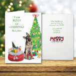 Funny German Shepherd Bereit für Weihnachten<br><div class="desc">Der Deutsche Schäferhund auf der Vorderseite dieser Karte Staaten, dass er "Weihnachten bereit" in diesem Jahr. Er sitzt vor einem verzierten Holiday-Baum, neben ihm ein Santa-Sack von Geschenken. Ein Geschenk ist schon zwischen seinen Pfoten. Die Stimmung wird im Inneren fortgesetzt und sollte dem Empfänger ein Lächeln bringen. Der gesamte Text...</div>