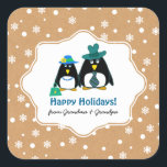 Funny Penguin Couple Custom Christmas Stickers<br><div class="desc">Gute Ferien von Oma und Opa. Funny Pinguin Couple Design mit Kraft Papier Effekt Hintergrund Weihnachten Custom Geschenkklammer für Enkel von Großeltern. Passende Karten und Geschenke mit verschiedenen Pinguinfamilien in der Weihnachts- und Neujahrskategorie unseres Stores.</div>