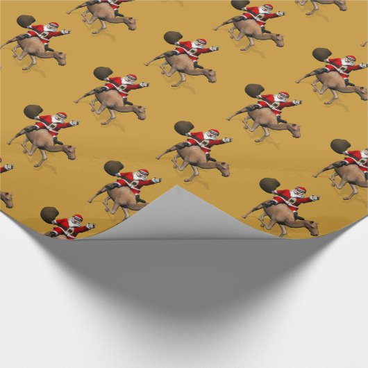 Funny Santa Claus reiten auf Camel Geschenkpapier (Ecke)