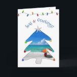 Funny Seas and Greetings Foto von Beach Christmas  Feiertagskarte<br><div class="desc">Wish them Seasons Greetings this holiday season with this funny and cute foto beach Christmas card with the greeting, "Seas & Greetings" in arched machen featuring a white sandy beach, red beach umbrella, and seascape inside of a whimsical Christmas tree! Inside of the card feature your foto and the message,...</div>