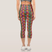 Fusionsmuster mit Blume und Händen Capri Leggings (Rückseite)
