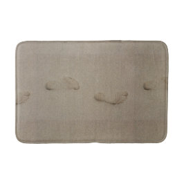 Fußabdrücke im Sand Badematte