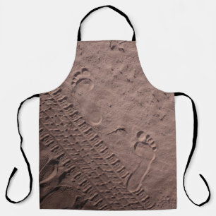 Fußabdrücke im Sand Schürze