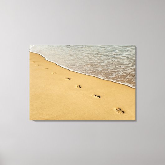 Fußabdrücke in Sand mit Wave Leinwanddruck (Vorderseite)