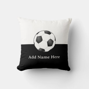 Fußball auf schwarzem und weißem Hintergrund Kissen