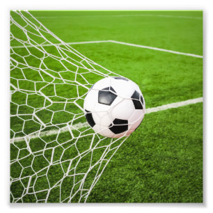 Fußball-Ball, der das Ziel-Netz trifft Fotodruck
