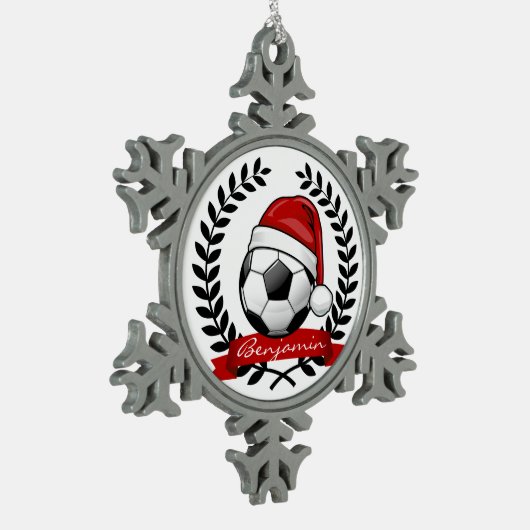 Fußball-Ball, der ein Schneeflocken Zinn-Ornament (Links)