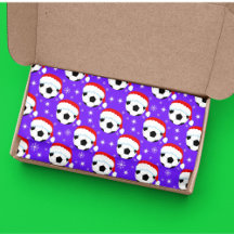 Fußball-Ball mit Hut und Schneeflocken des Weihnac