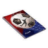 Fußball, der den roten, blauen Fußball des Mädchen Notizblock (Rechte Seite)