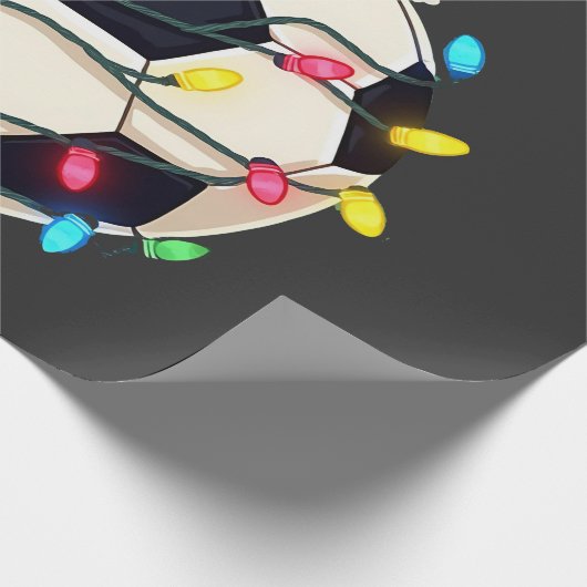 Fußball im Weihnachtslicht ummantelt Fußball-Spiel Geschenkpapier (Ecke)