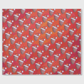 Fußball in Weihnachtsmannmütze über Rot Geschenkpapier (Flach)