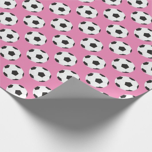 Fußball-Kugelmuster rosa Geschenkpapier (Ecke)