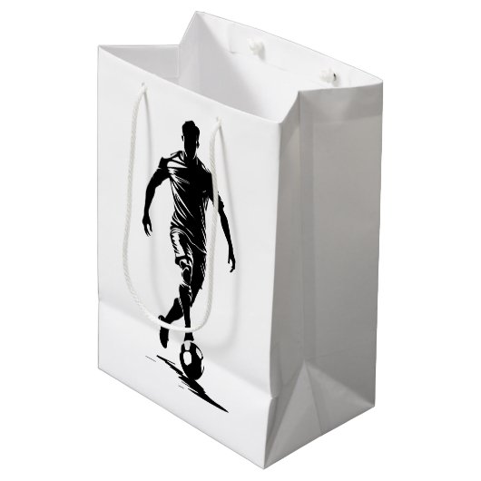 Fußball-Mann mit Ball-Design. Mittlere Geschenktüte (Vorderseite Schrägansicht)