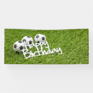Fußball mit Happy Birthday Wort auf Grün Banner