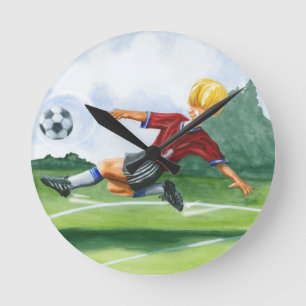 Fußball-Spieler, der einen Ball durch Jay Runde Wanduhr