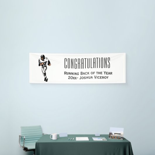 Fußball-Spieler mit eigenem Fußball-Text Banner (Messeveranstaltung)