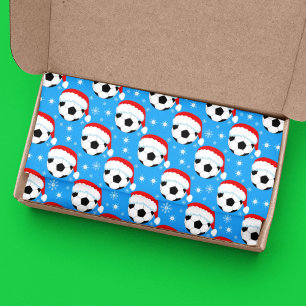 Fußball trägt Santas Hut und Schneeflocken Blau Seidenpapier