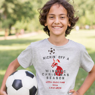 Fußball-Weihnachtsmann tritt eine gewinnende Weihn T-Shirt