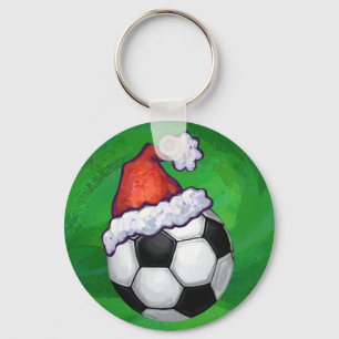 Fußball-Weihnachtsmannmütze auf Grün Schlüsselanhänger