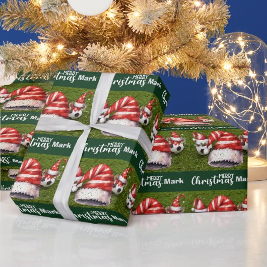 Fußballball mit Weihnachtsmannmütze Geschenkpapier (Feiertage)