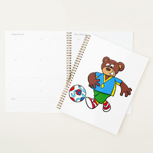 Fußballbär spielt Fußball in Sportkleidung Planer