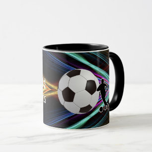 Fußballspieler-Silhouette und Fußball Tasse