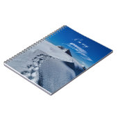 Fußspuren im Schneemobil Notizblock (Linke Seite)