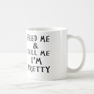 füttern Sie mich und sagen Sie mir, dass ich Kaffeetasse