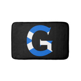 G Monogram überlagert sich auf schottischer Flagge Badematte