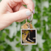 Gähnender und einschüchternder Mund von einem Schlüsselanhänger (Hand)