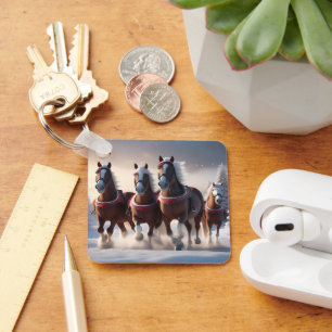 Galloping durch den Schnee: Die magischen Pferde d Schlüsselanhänger