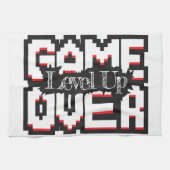 Game Over, Level Up: Pixelated Retro Game Welt Geschirrtuch (Horizontal)