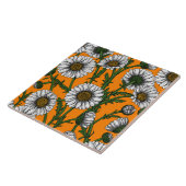 Gänseblümchen auf orange fliese (Seite)