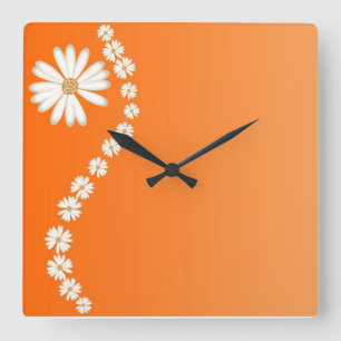Gänseblümchen auf orange quadratischer Wanduhr