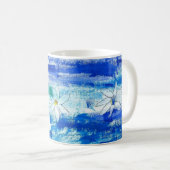 Gänseblümchen in Blauem und in weißem Kaffeetasse (VorderseiteRechts)