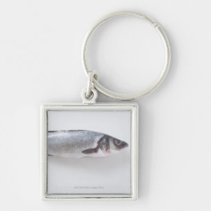 Ganze branzini Fische Schlüsselanhänger