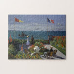 Garten bei Sainte-Adresse von Claude Monet Puzzle<br><div class="desc">Das Garden at Sainte-Adresse ist ein Gemälde des französischen impressionistischen Malers Claude Monet. (Öl auf Leinwand, 98, 1 cm x 129, 9 cm). Das Gemälde wurde vom Metropolitan Museum of Art nach einem Auktionsverkauf bei Christie's im Dezember 1967 unter dem französischen Titel La terrasse à Sainte-Adresse erworben.[1] Das Gemälde wurde...</div>