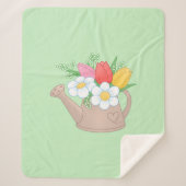 Gartenwasserdose mit Blume auf Grün Sherpadecke (Vorderseite)